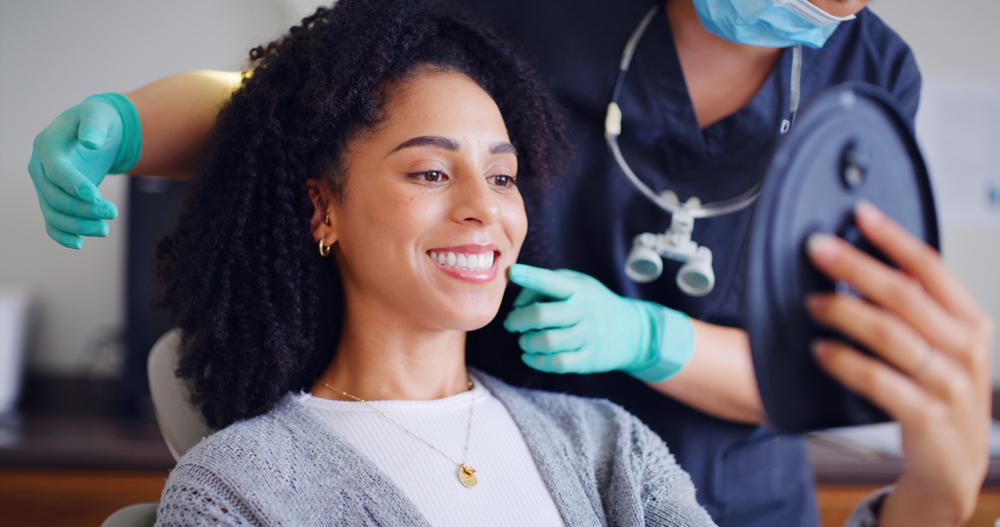 A happy Cosmetic Dentistry patient at Westbank Dental Care & Implant Centre West Kelowna